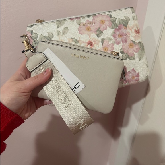 Nine West Handbags - NWT 2 piece floral wristlet set